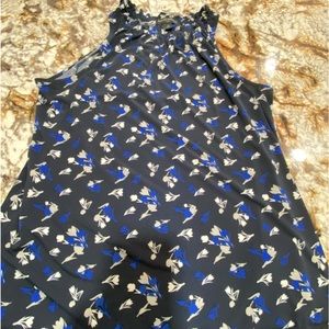 Banana Republic size M cut away shoulder top.  Black w/royal blue & white